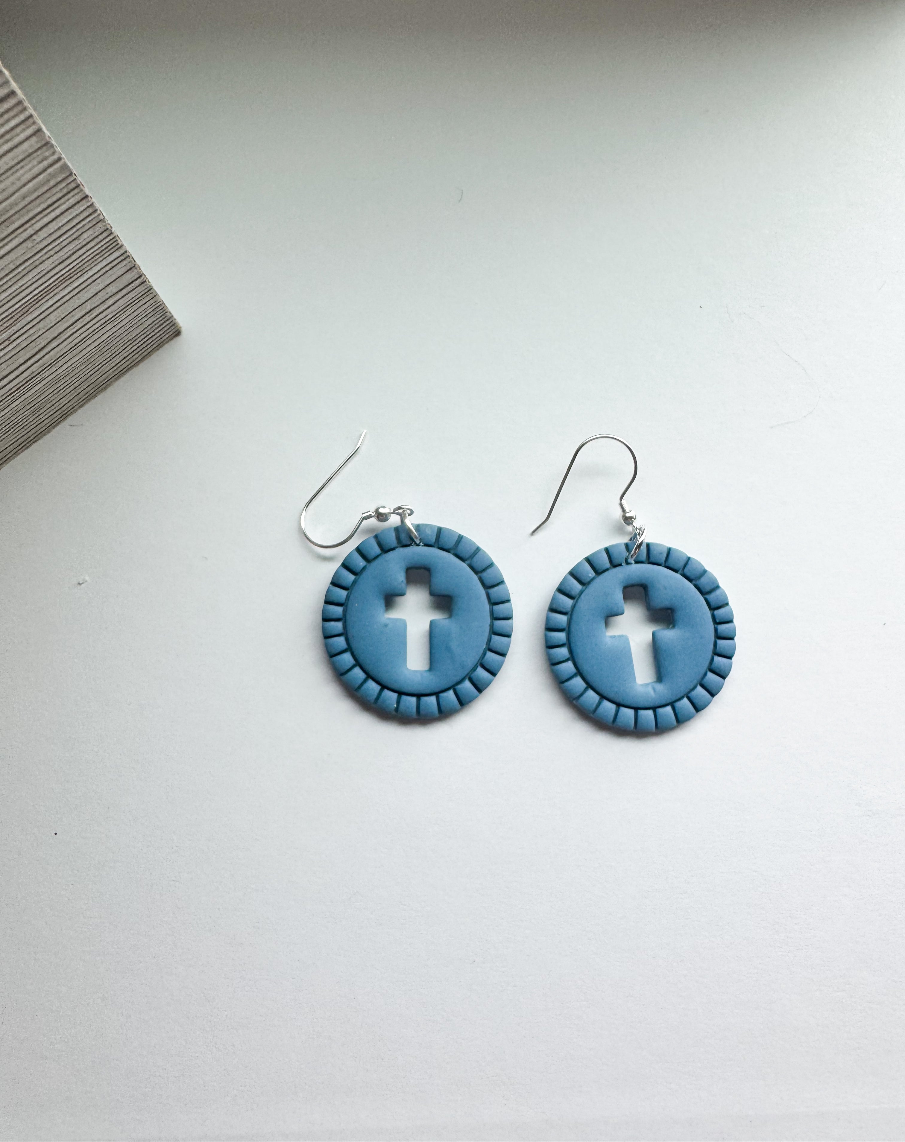 Grace Glow: cross cut out round dangles