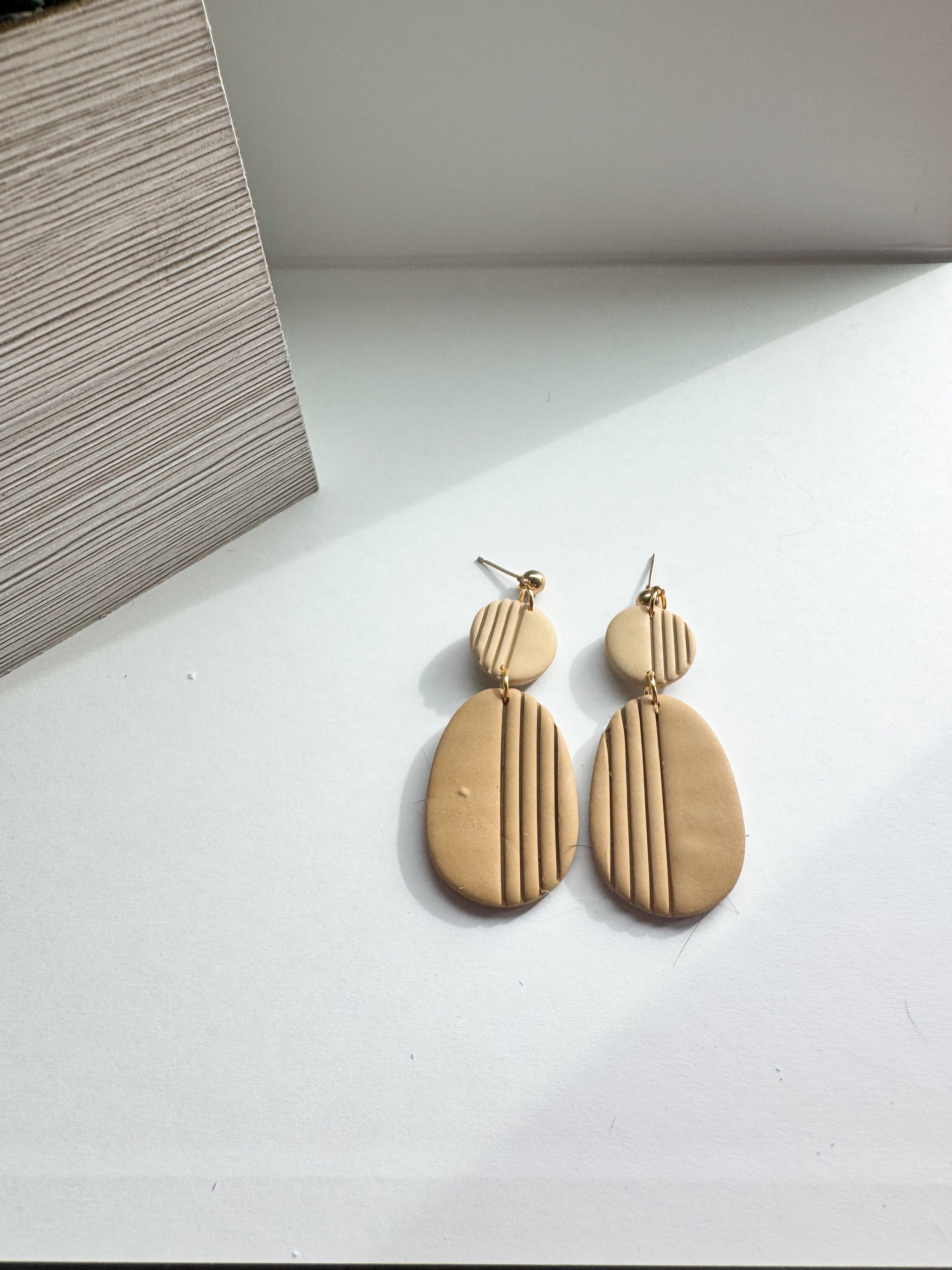 Blush Drift: muted tone oval dangles with strips