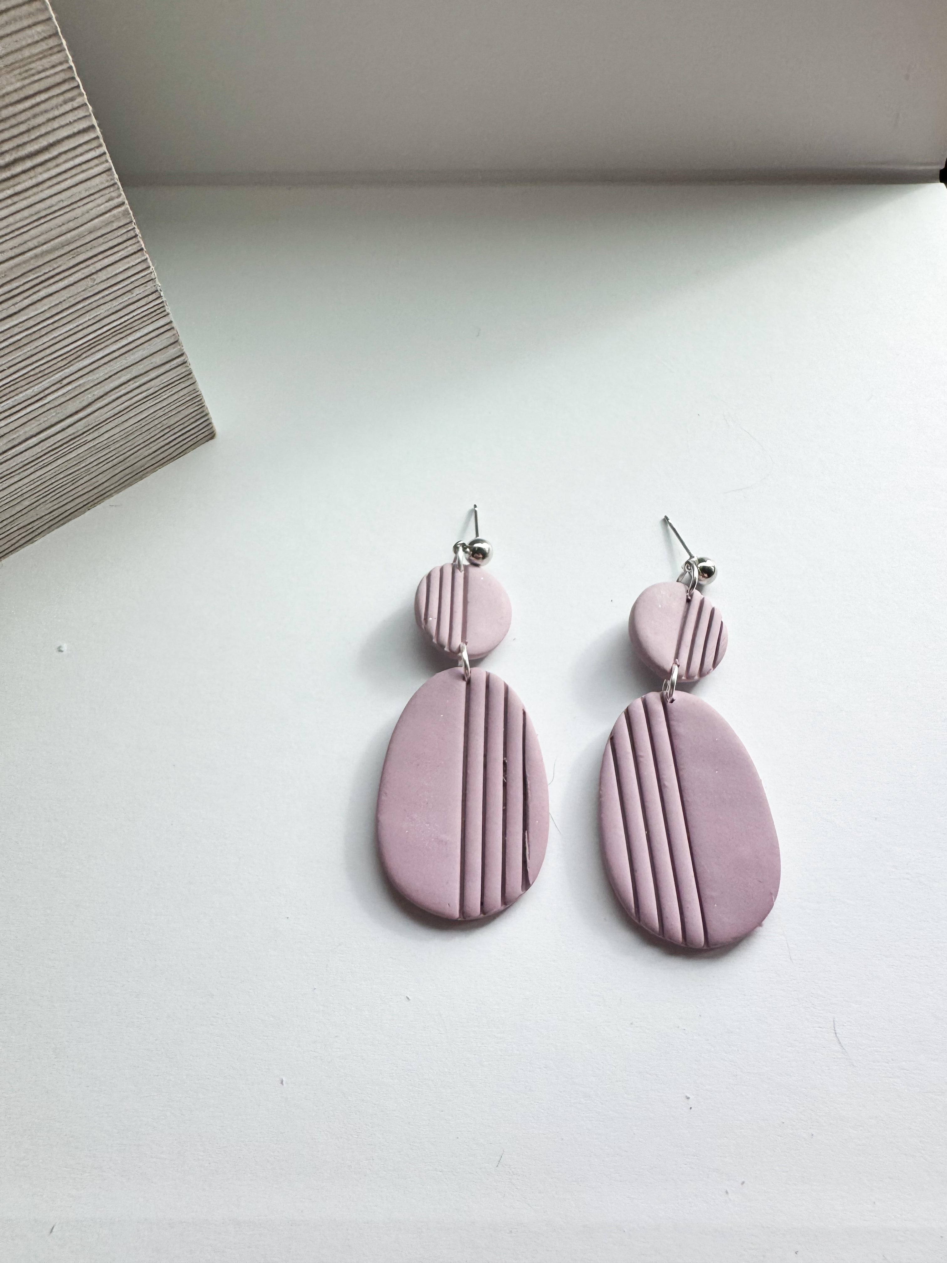 Blush Drift: muted tone oval dangles with strips