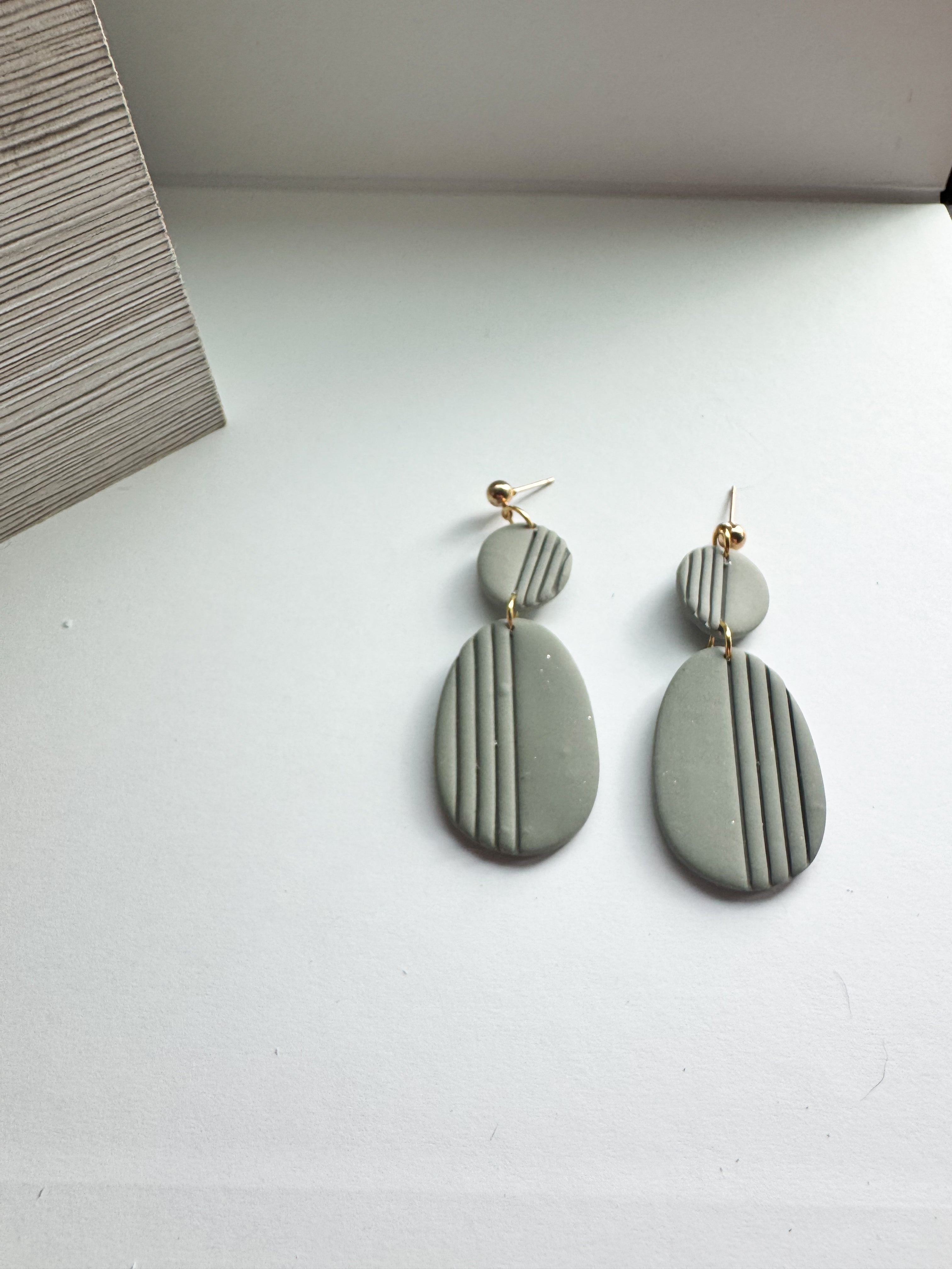 Blush Drift: muted tone oval dangles with strips