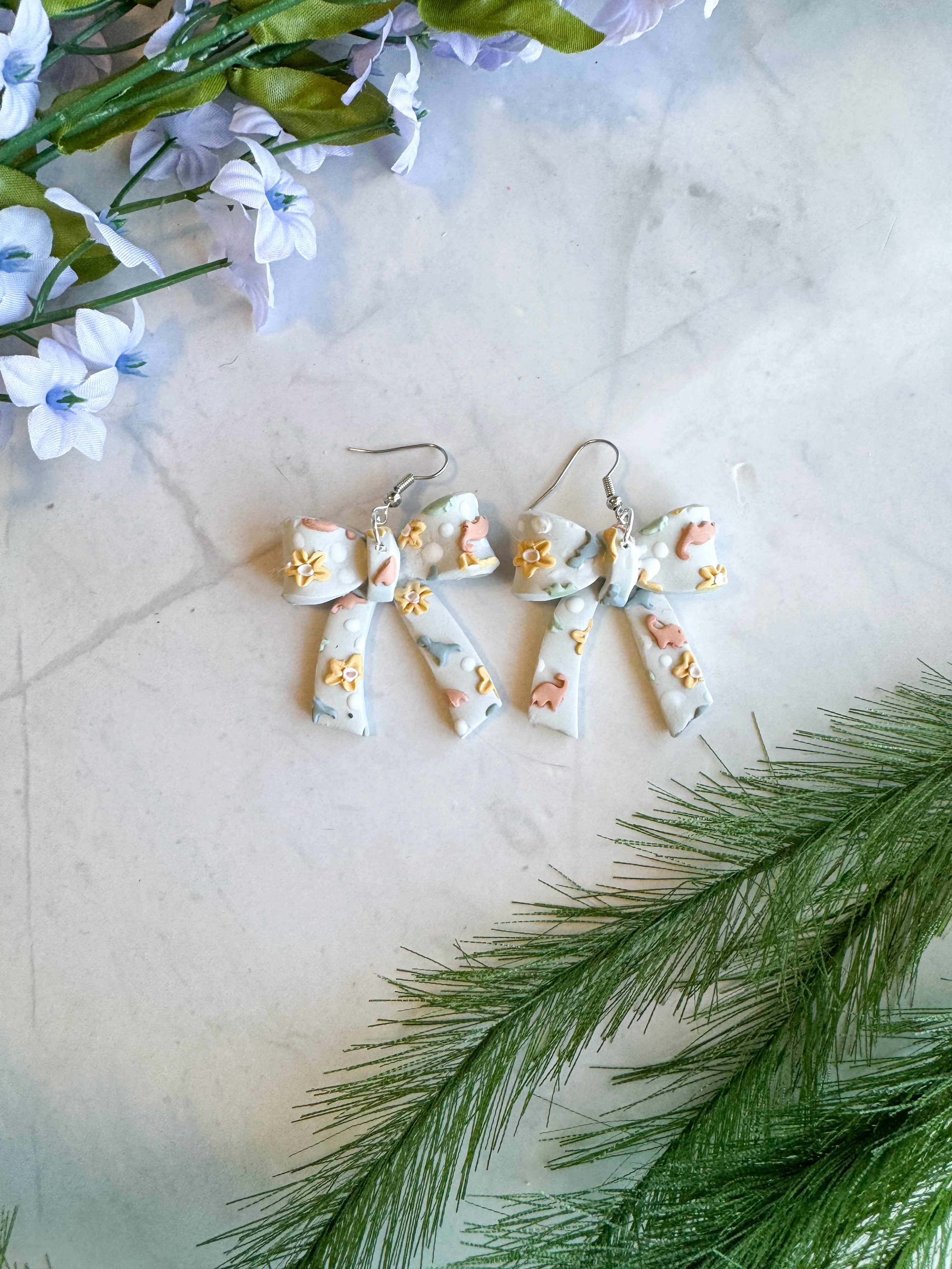 Multi Dino Bow Clay Earrings