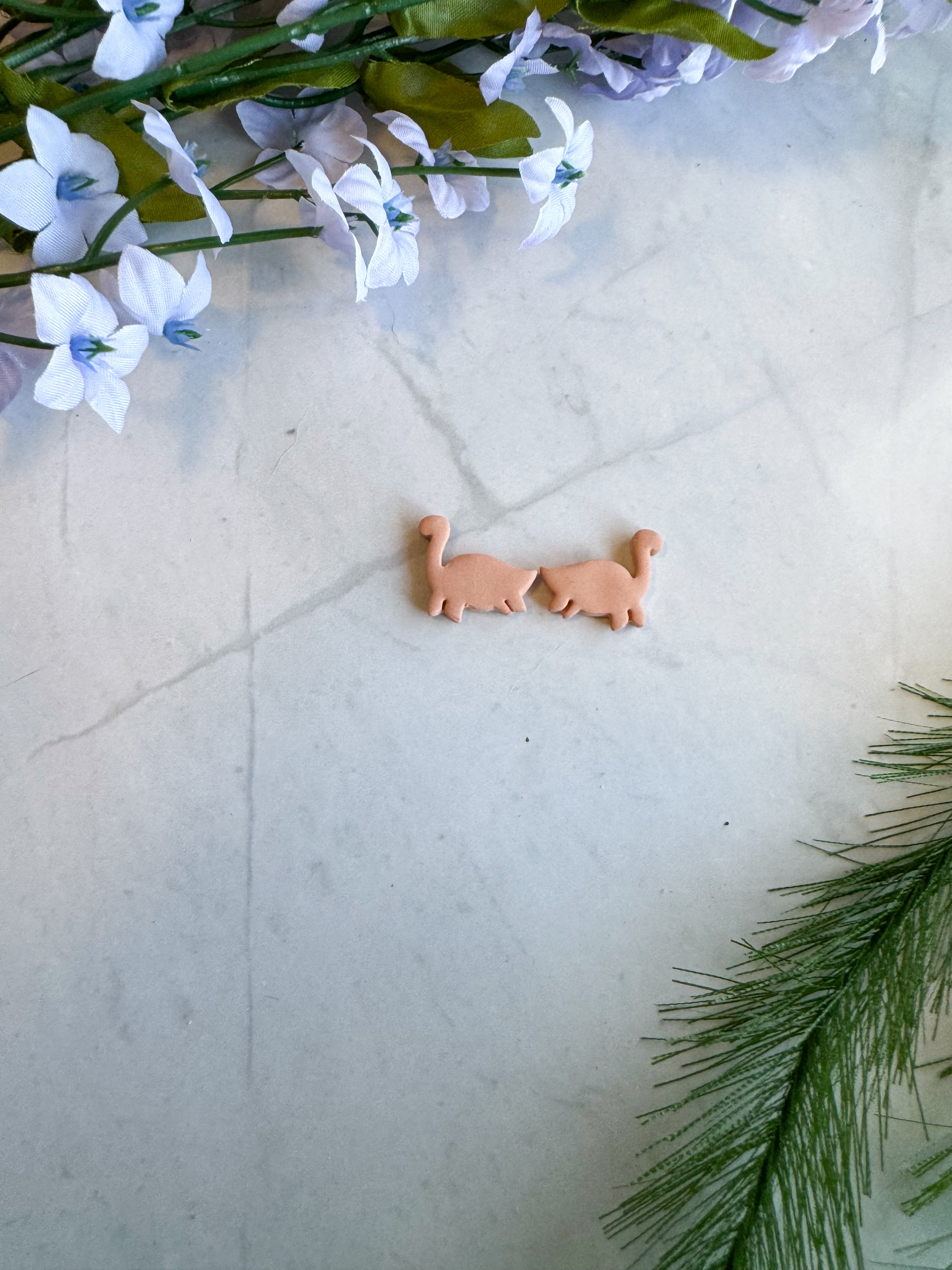 Individual Dino Studs