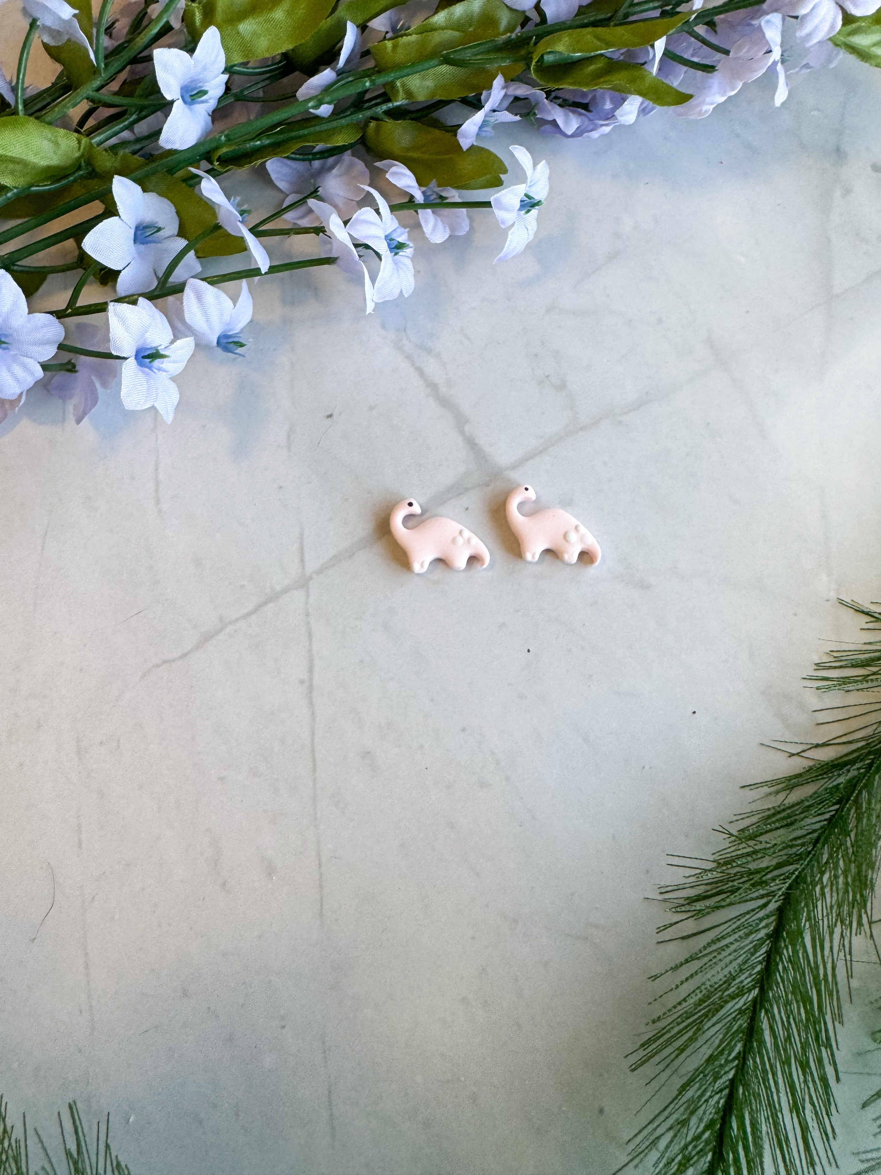 Individual Dino Studs