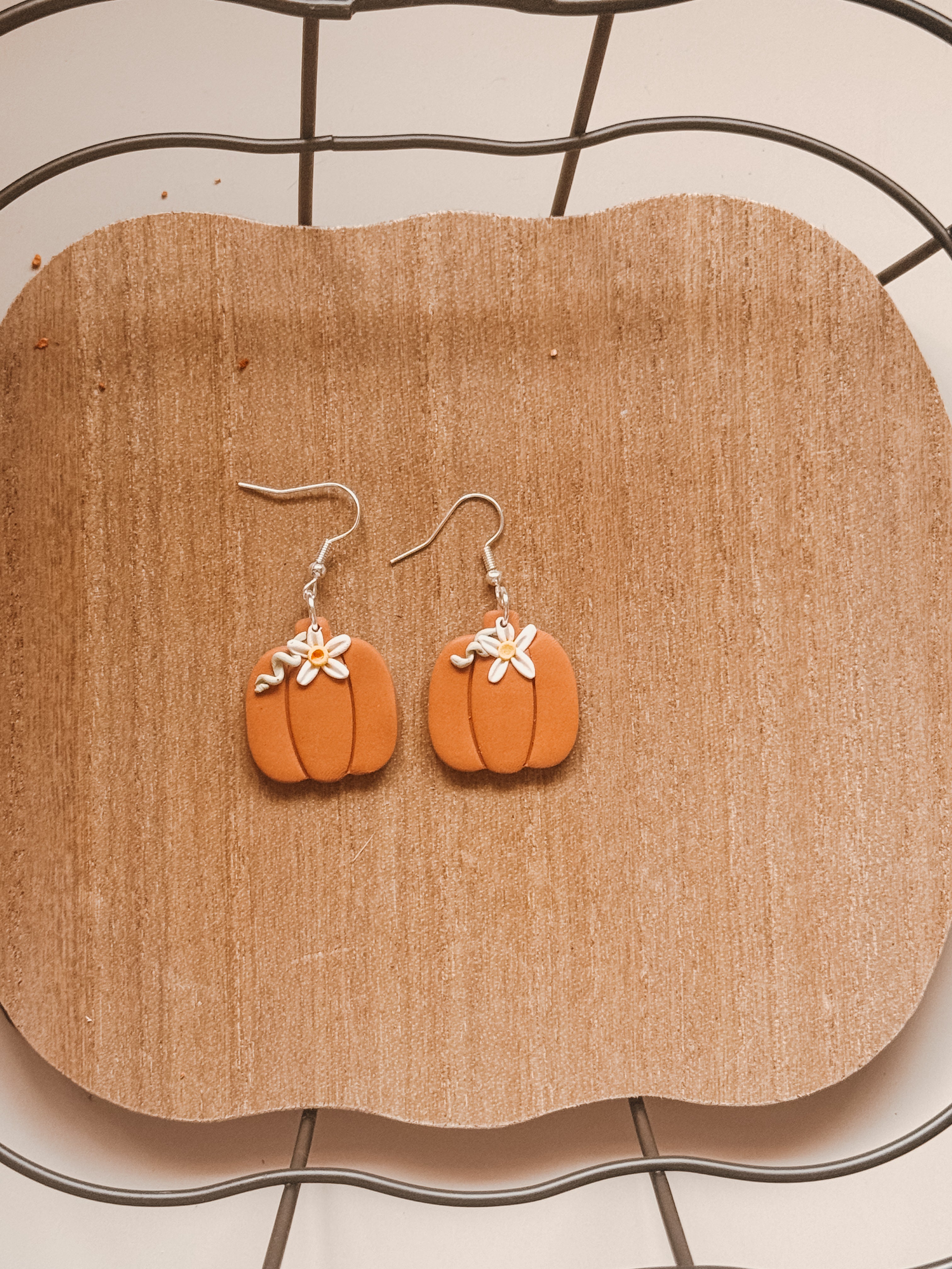 Pumpkin with small flower clay earrings