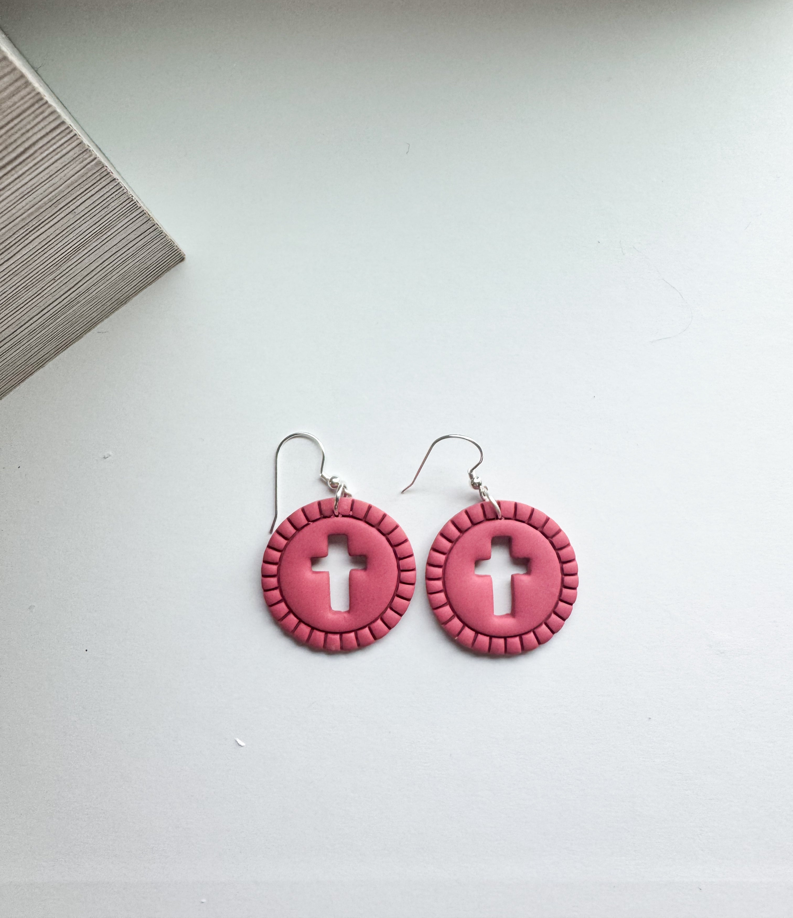Grace Glow: cross cut out round dangles