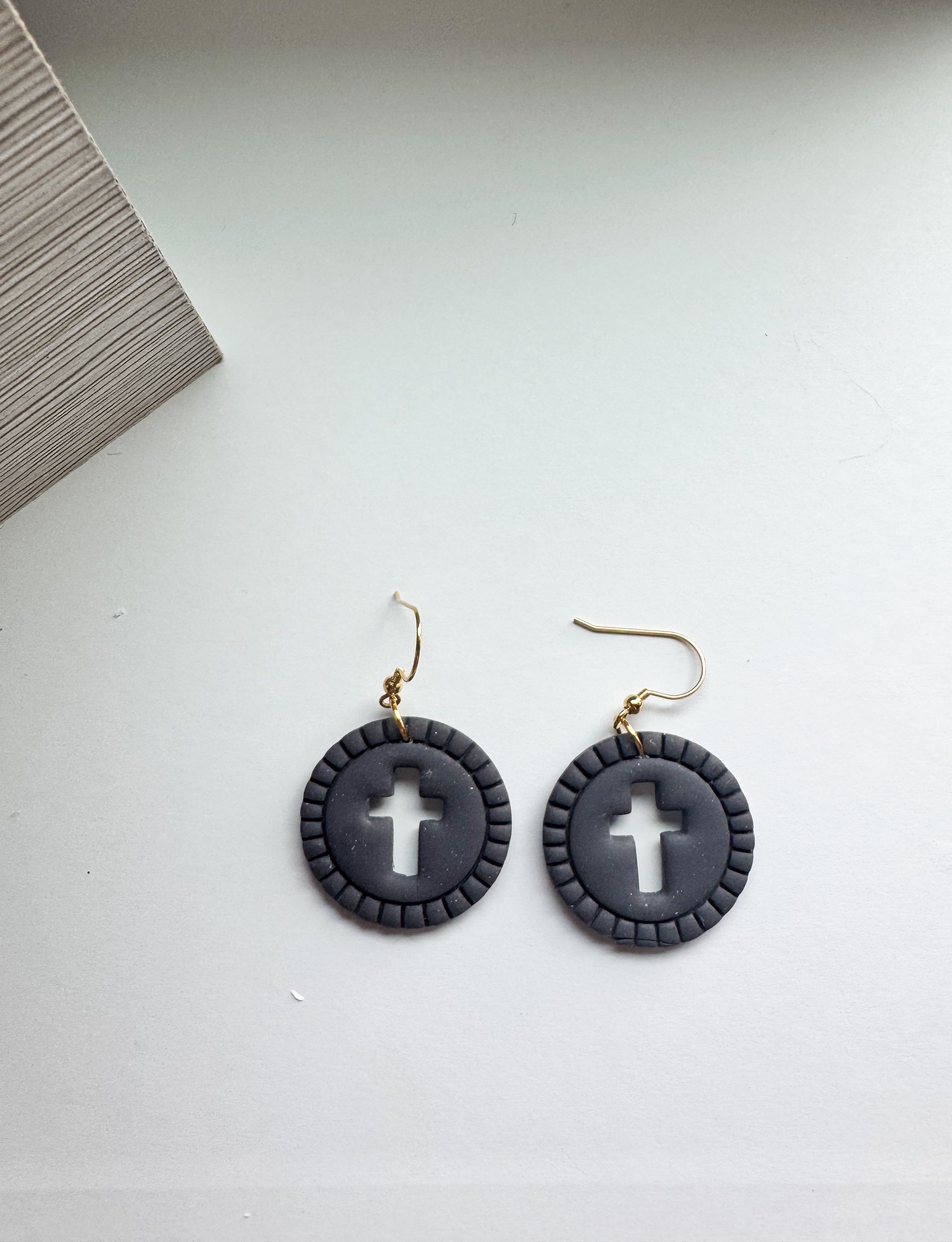 Grace Glow: cross cut out round dangles