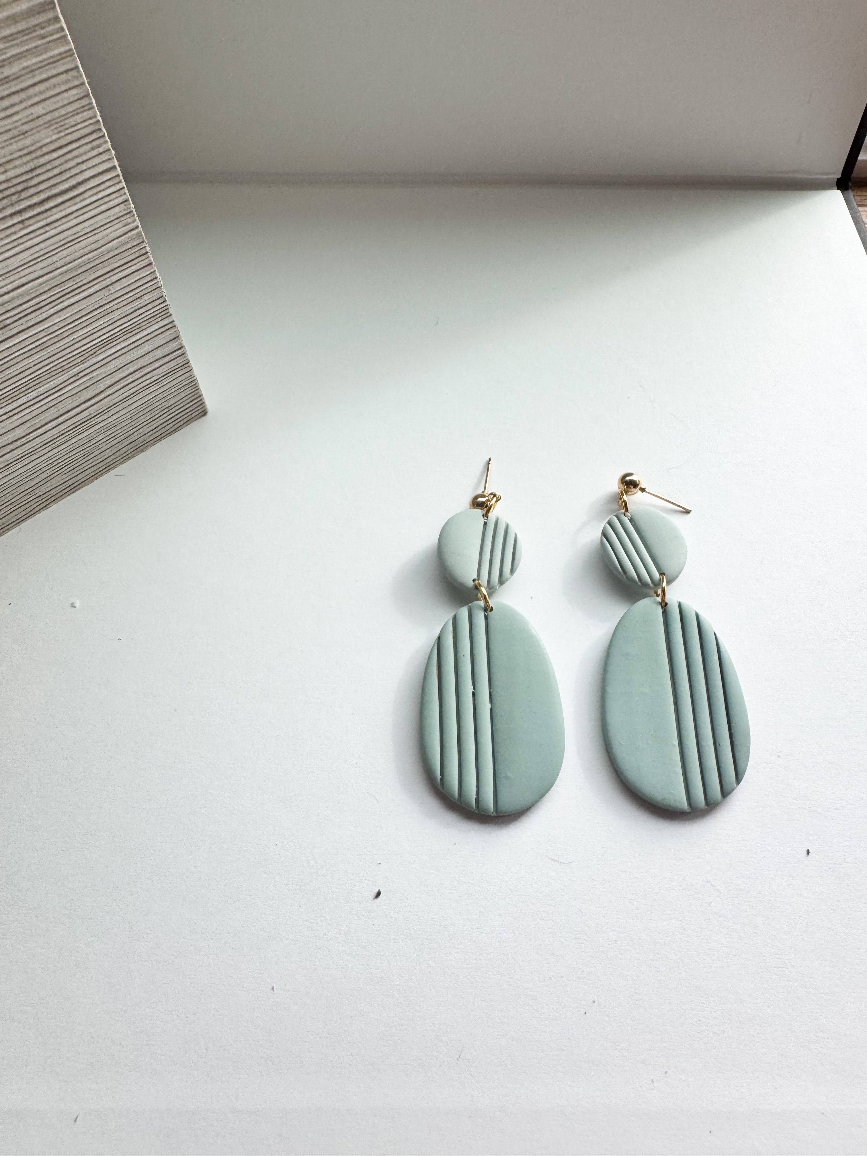 Blush Drift: muted tone oval dangles with strips