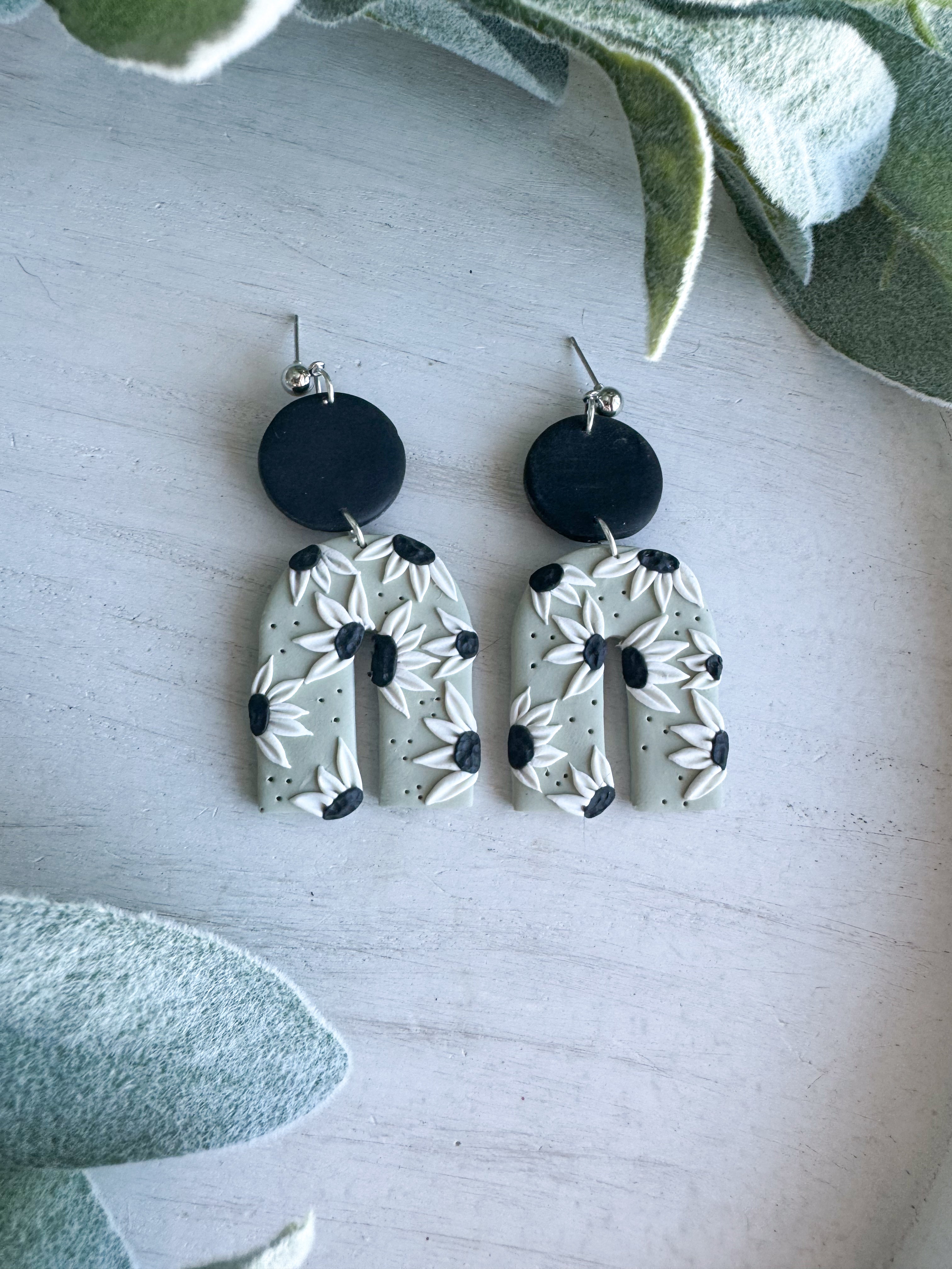 Sage Green Arch with White Daisies and black Detailing Clay Earrings