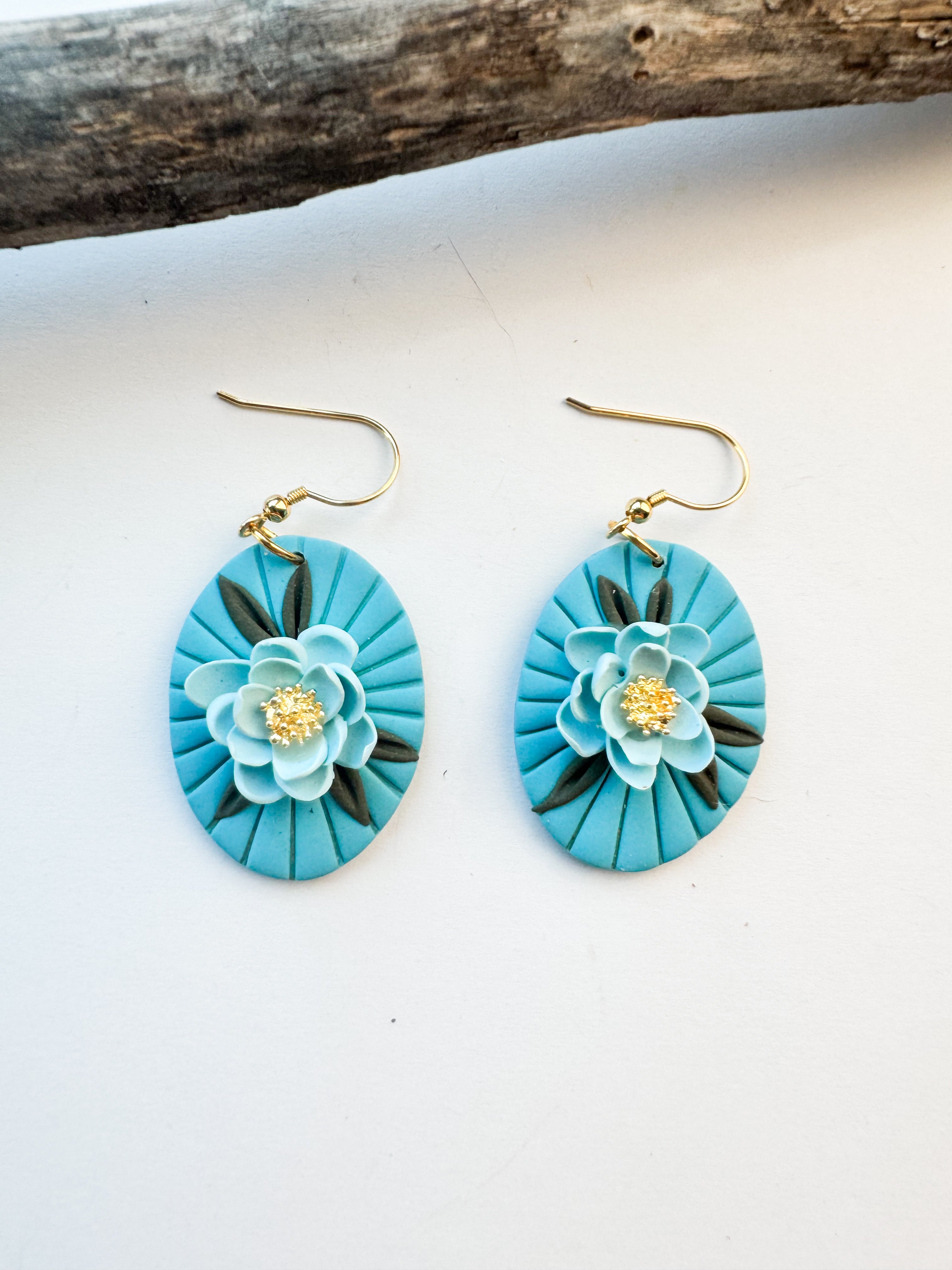 Turquoise Oval with White Floral Accent Earrings