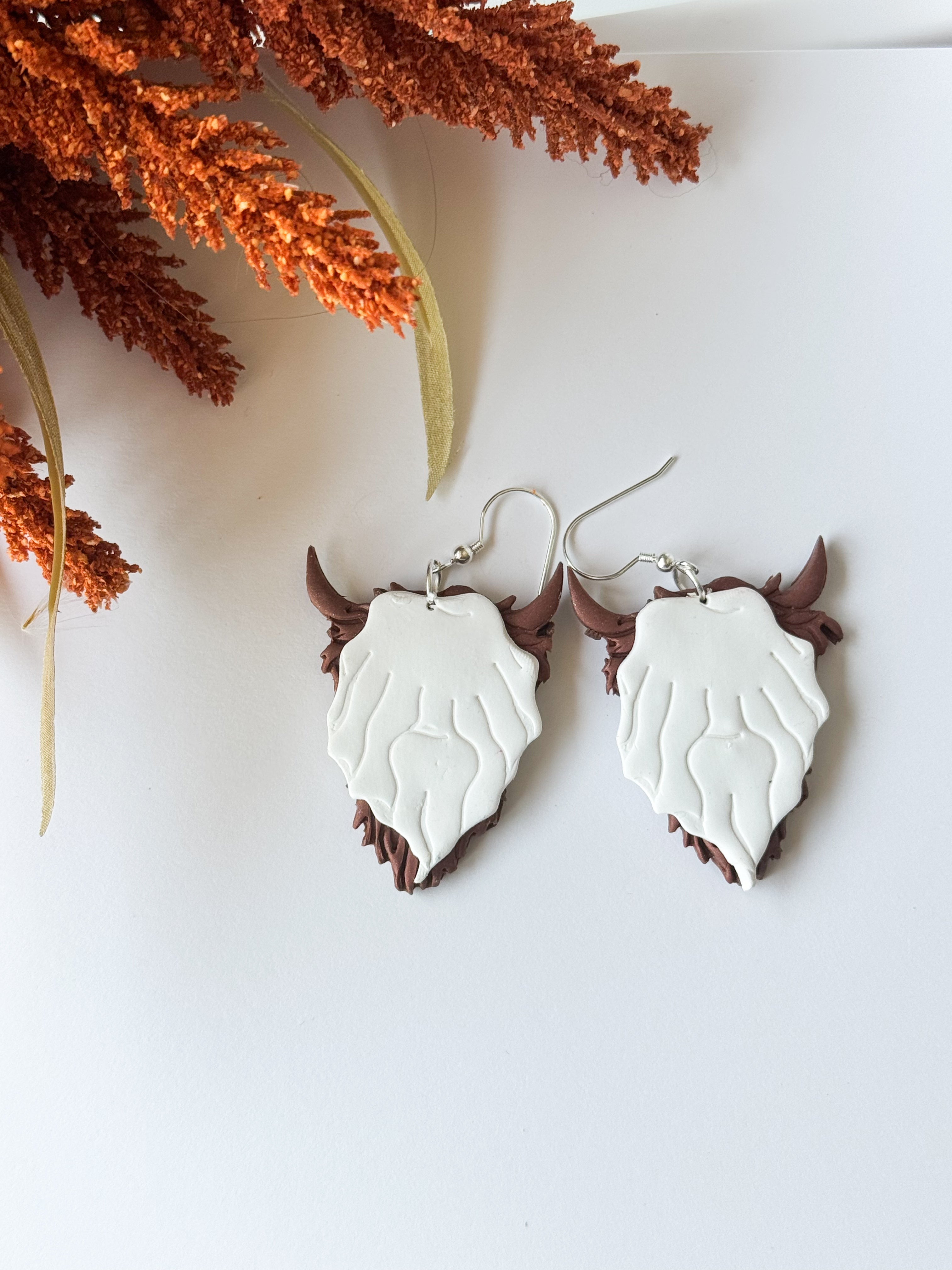 Haunted Highland Cow Clay Earrings